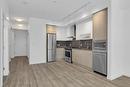 103-1800 Richter Street, Kelowna, BC  - Indoor Photo Showing Kitchen With Stainless Steel Kitchen 