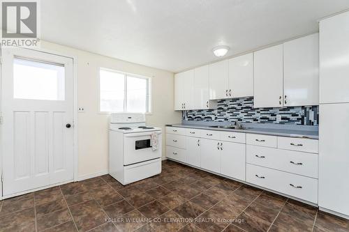 555 Champlain Road, Tiny, ON - Indoor Photo Showing Kitchen With Double Sink