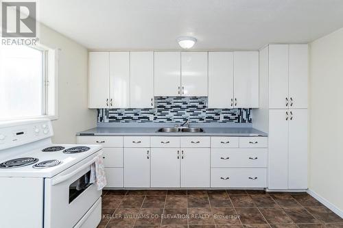 555 Champlain Road, Tiny, ON - Indoor Photo Showing Kitchen With Double Sink