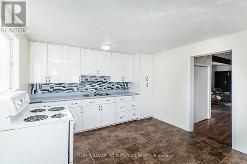 555 Champlain Road, Tiny, ON - Indoor Photo Showing Kitchen With Double Sink