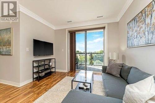 413 - 383 Main Street E, Milton, ON - Indoor Photo Showing Living Room