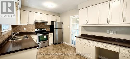 131 Broadlands Boulevard, Toronto, ON - Indoor Photo Showing Kitchen With Stainless Steel Kitchen With Double Sink