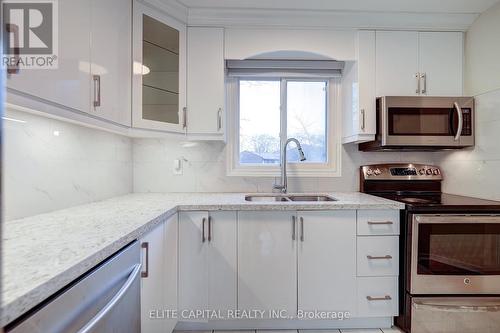 9 Lofty Hill Way, Toronto, ON - Indoor Photo Showing Kitchen With Double Sink