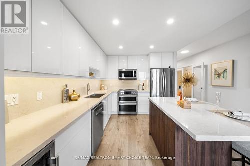 1211 - 100 Harrison Garden Boulevard, Toronto, ON - Indoor Photo Showing Kitchen With Stainless Steel Kitchen With Double Sink With Upgraded Kitchen