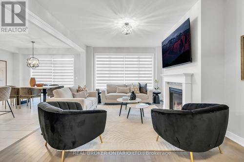 1058 Thompson Drive, Oshawa, ON - Indoor Photo Showing Living Room With Fireplace