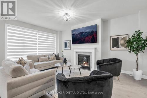 1058 Thompson Drive, Oshawa, ON - Indoor Photo Showing Living Room With Fireplace