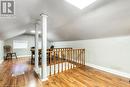 Bonus room with hardwood / wood-style floors, vaulted ceiling, and ornate columns - 9 Adam Street, Cambridge, ON 