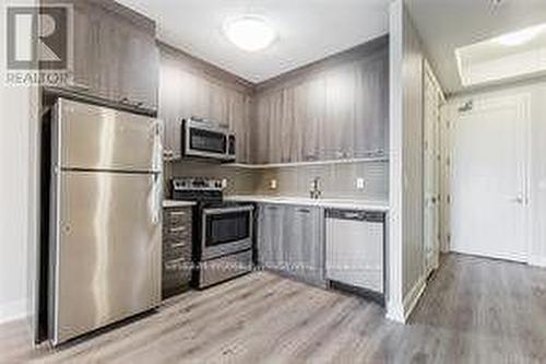 706 - 150 Main St Street W, Hamilton, ON - Indoor Photo Showing Kitchen With Stainless Steel Kitchen