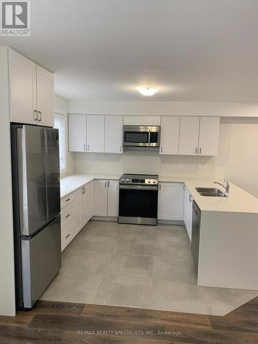 3 - 175-177 Russell Avenue, St. Catharines, ON - Indoor Photo Showing Kitchen With Double Sink