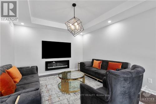 303 Citrine Street, Ottawa, ON - Indoor Photo Showing Living Room With Fireplace