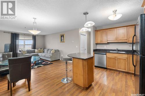 A207 103 Wellman Crescent, Saskatoon, SK - Indoor Photo Showing Kitchen With Double Sink