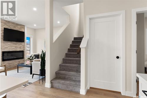 186 Kostiuk Crescent, Saskatoon, SK - Indoor Photo Showing Other Room With Fireplace