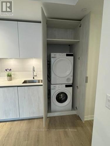 1009 - 8 Widmer Street, Toronto, ON - Indoor Photo Showing Laundry Room