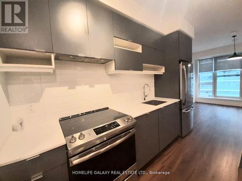 416 - 4065 Confederation Parkway, Mississauga, ON - Indoor Photo Showing Kitchen With Stainless Steel Kitchen