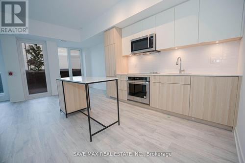 Th108 - 220 Missinnihe Way, Mississauga, ON - Indoor Photo Showing Kitchen