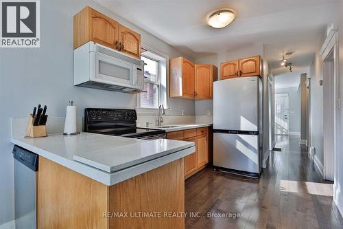 49 Fourth Street S, Toronto, ON - Indoor Photo Showing Kitchen With Double Sink