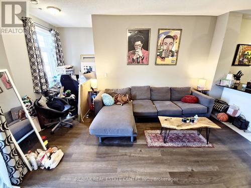 110 - 1360 Costigan Road, Milton, ON - Indoor Photo Showing Living Room