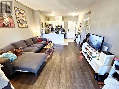 110 - 1360 Costigan Road, Milton, ON - Indoor Photo Showing Living Room