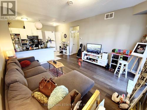 110 - 1360 Costigan Road, Milton, ON - Indoor Photo Showing Living Room