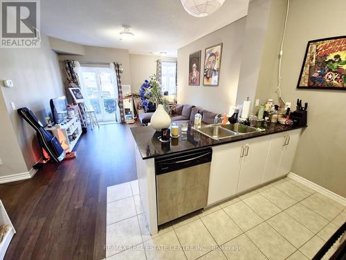 110 - 1360 Costigan Road, Milton, ON - Indoor Photo Showing Kitchen With Double Sink