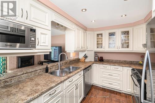 2 - 2052 Brant Street, Burlington, ON - Indoor Photo Showing Kitchen With Double Sink