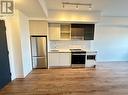 702 - 395 Dundas Street W, Oakville, ON  - Indoor Photo Showing Kitchen 