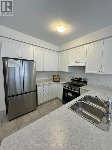 1008 Crowsnest Hollow, Pickering, ON - Indoor Photo Showing Kitchen With Double Sink