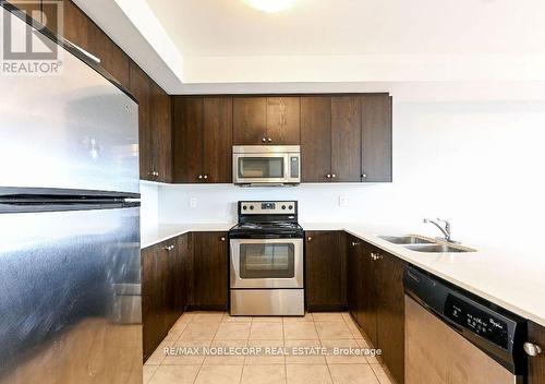 9 - 9601 Jane Street, Vaughan, ON - Indoor Photo Showing Kitchen With Stainless Steel Kitchen With Double Sink