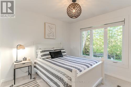 48 Lawrence Avenue, Springwater, ON - Indoor Photo Showing Bedroom