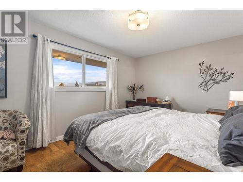 170 Mars Road, Kelowna, BC - Indoor Photo Showing Bedroom