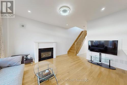 8 Lantern Court, Toronto, ON - Indoor Photo Showing Living Room With Fireplace