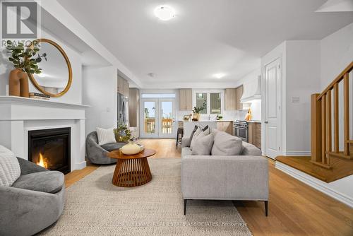 4060 Kadic Terrace, Mississauga, ON - Indoor Photo Showing Living Room With Fireplace