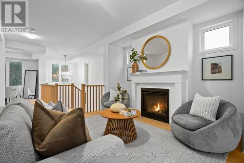 4060 Kadic Terrace, Mississauga, ON - Indoor Photo Showing Living Room With Fireplace