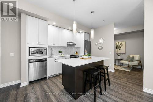 314 - 40 Esplanade Lane, Grimsby, ON - Indoor Photo Showing Kitchen With Double Sink