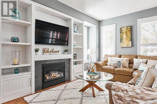 133 Vipond Road, Whitby, ON - Indoor Photo Showing Living Room With Fireplace