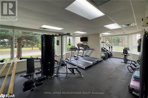 Exercise room with a drop ceiling - 135 Hillcrest Avenue Unit# 1013, Mississauga, ON - Indoor Photo Showing Gym Room