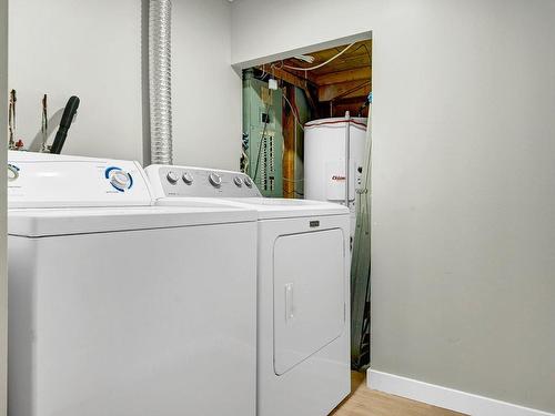 Laundry room - 42 Av. Carmen, Saint-Sauveur, QC - Indoor Photo Showing Laundry Room