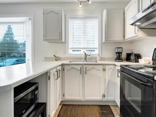 Kitchen - 42 Av. Carmen, Saint-Sauveur, QC - Indoor Photo Showing Kitchen With Double Sink