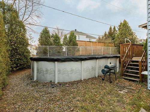 Cour - 59 Rue Perrier, Notre-Dame-De-L'Île-Perrot, QC - Outdoor With Above Ground Pool