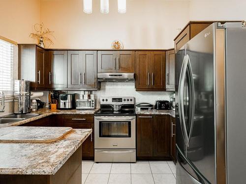 Cuisine - 59 Rue Perrier, Notre-Dame-De-L'Île-Perrot, QC - Indoor Photo Showing Kitchen With Double Sink