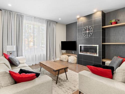 Salon - 11855 Rue Du Cuivre, Mirabel, QC - Indoor Photo Showing Living Room With Fireplace