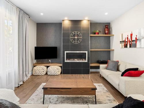 Salon - 11855 Rue Du Cuivre, Mirabel, QC - Indoor Photo Showing Living Room With Fireplace