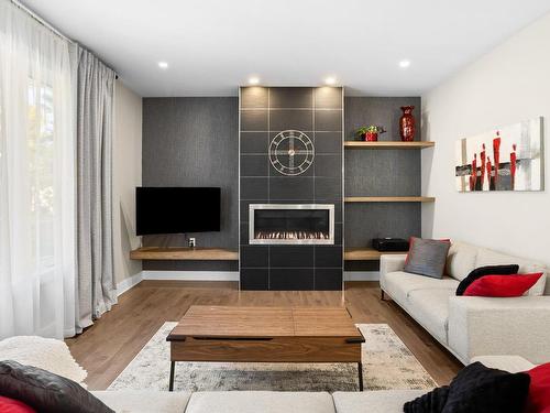 Salon - 11855 Rue Du Cuivre, Mirabel, QC - Indoor Photo Showing Living Room With Fireplace