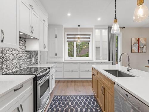 Cuisine - 11855 Rue Du Cuivre, Mirabel, QC - Indoor Photo Showing Kitchen With Upgraded Kitchen