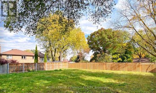 25 Bellamy Road S, Toronto, ON - Outdoor With Backyard