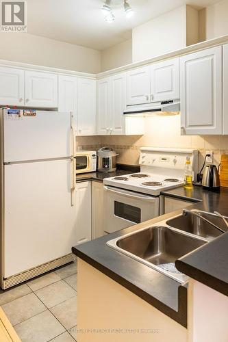 1204 - 393 King Street W, Toronto, ON - Indoor Photo Showing Kitchen With Double Sink