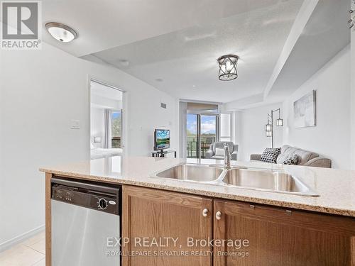 714 - 9 George Street N, Brampton, ON - Indoor Photo Showing Kitchen With Double Sink