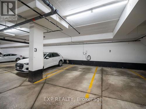 714 - 9 George Street N, Brampton, ON - Indoor Photo Showing Garage