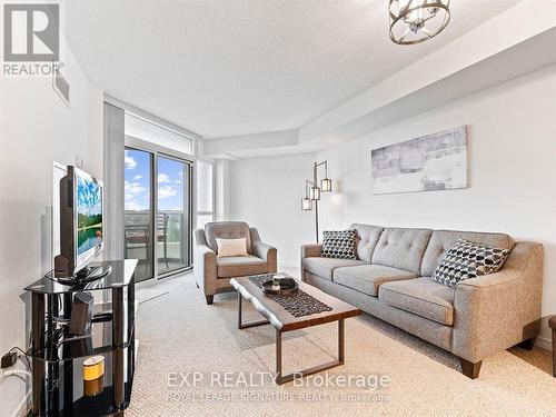 714 - 9 George Street N, Brampton, ON - Indoor Photo Showing Living Room