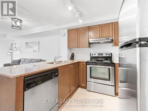 714 - 9 George Street N, Brampton, ON - Indoor Photo Showing Kitchen With Double Sink